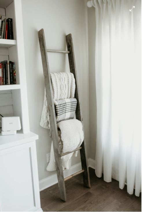 Ladder with blankets hung Ladder with blankets hung