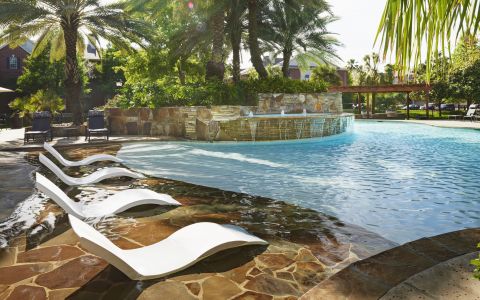 Swimming Pool with Sundeck at Camden Holly Springs Apartments in Houston, Texas