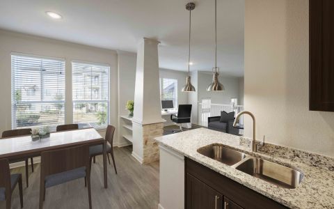 Townhome kitchen and dining area at Camden Cedar Hills apartments in Austin, TX