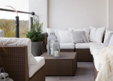 istockphoto Decorated patio with white pillows, white cushions and a white blanket.