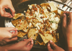 Plate of delicious nachos Header image with a plate of nachos
