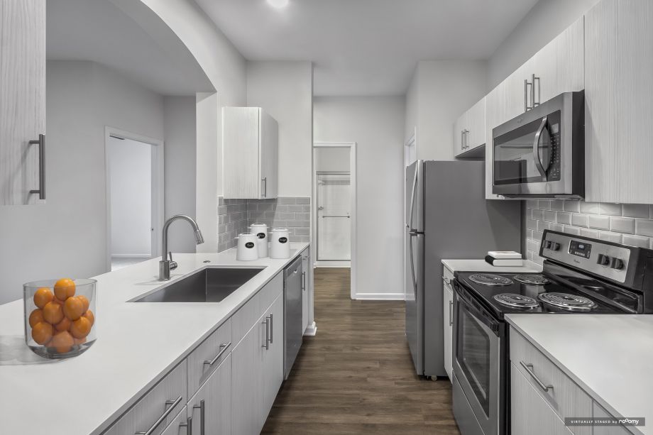 Kitchen with stainless steel appliances at Camden Governors Village Apartments in Chapel Hill, NC