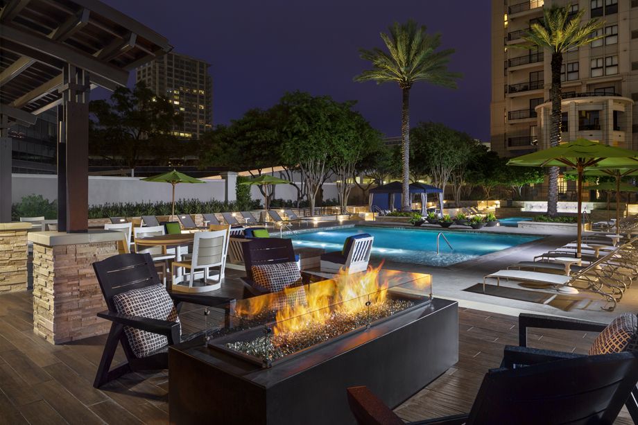 Fire Pit by the Pool at Camden Post Oak High Rise Luxury Apartments