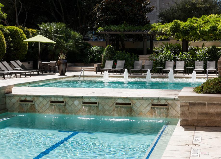 Swimming Pool with Lap Lane and Water Features at Camden Post Oak High Rise Luxury Apartments in Houston Galleria, Texas