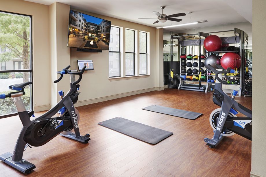 Fitness center with spin bikes at Camden Belmont apartments in Dallas, TX