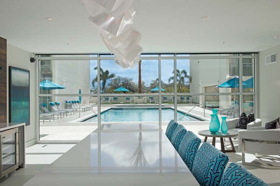 Clubroom with pool views at Camden Thornton Park apartments in Orlando, FL