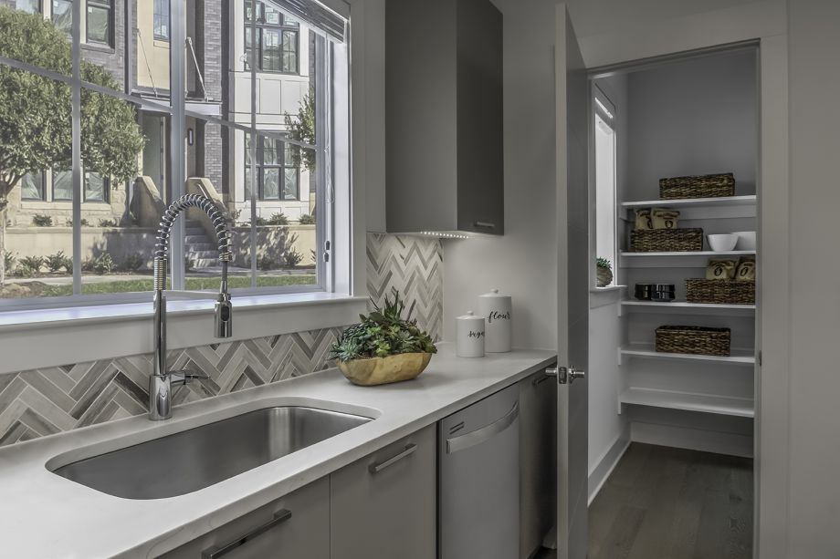 Kitchen with walk-in pantry at Camden Grandview Townhomes in Charlotte, NC