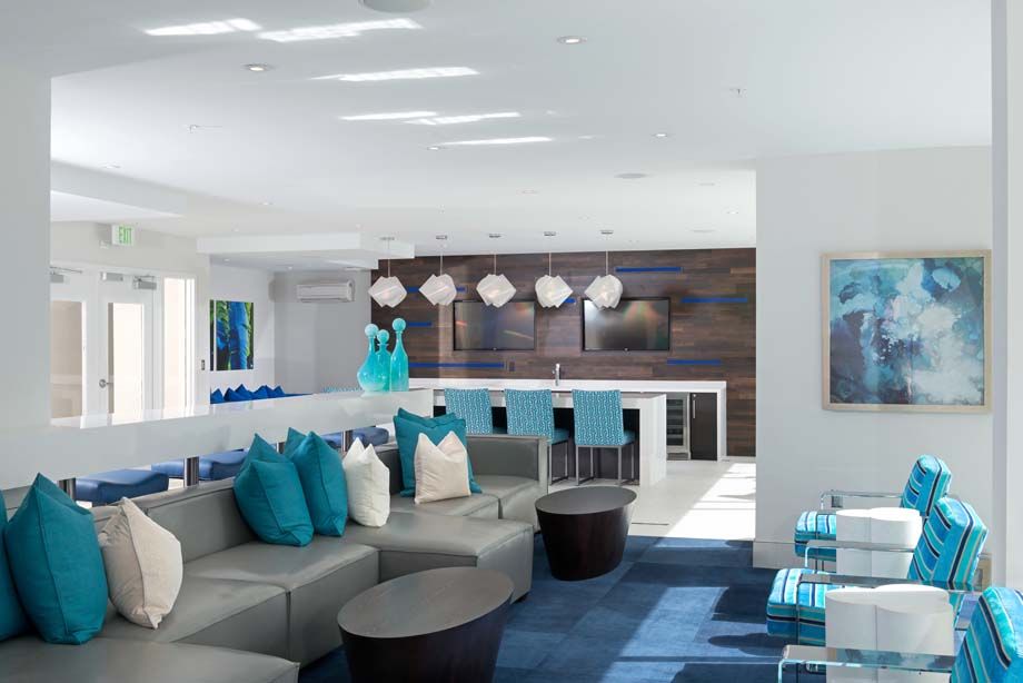 Clubroom with lounge seating at Camden Thornton Park apartments in Orlando, FL