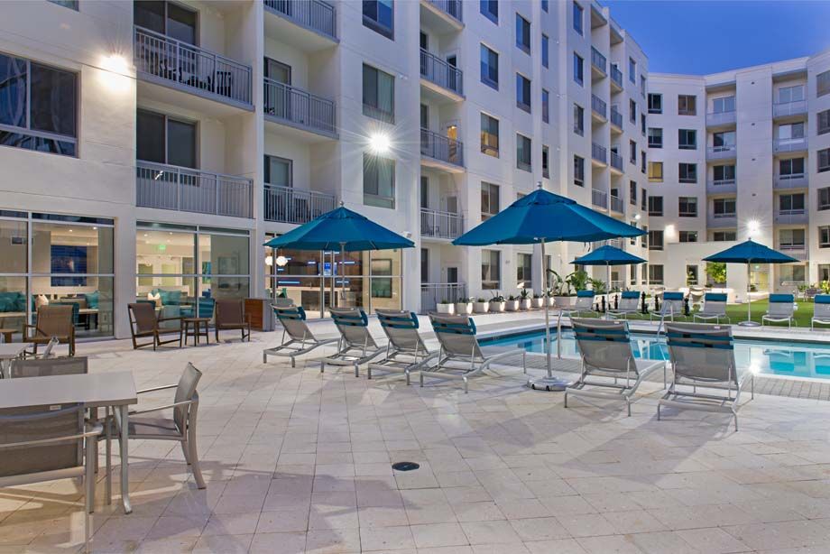 Amenity deck at dusk at Camden Thornton Park apartments in Orlando, FL