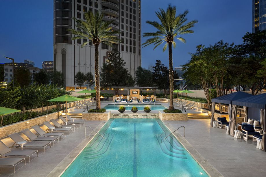Twilight by the Swimming Pool at Camden Post Oak High Rise Luxury Apartments