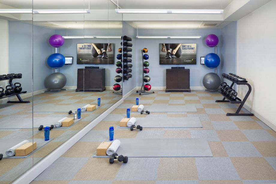 Yoga Room with On-Demand Virtual Trainer at Camden Post Oak High Rise Luxury Apartments in Houston Galleria, Texas
