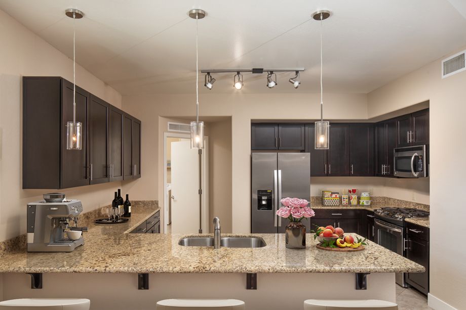Penthouse Kitchen with Stainless Steel at Camden Sotelo Apartments in Tempe, Arizona