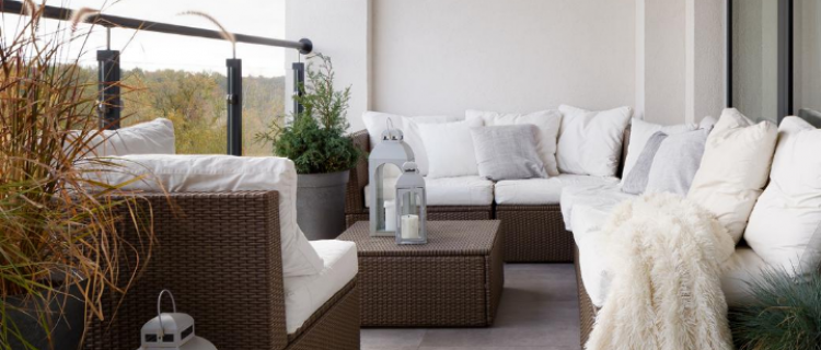 istockphoto Decorated patio with white pillows, white cushions and a white blanket.