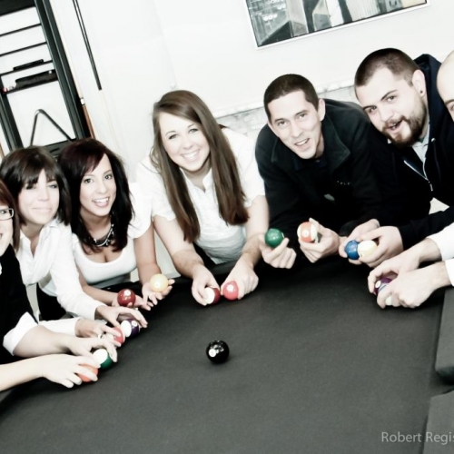 Camden employees playing pool